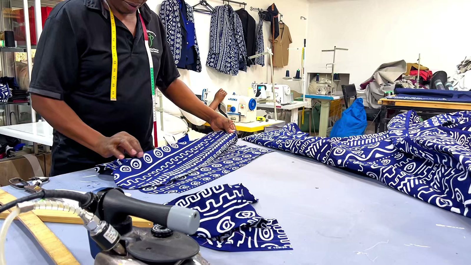 Laying out printed fabric for cutting