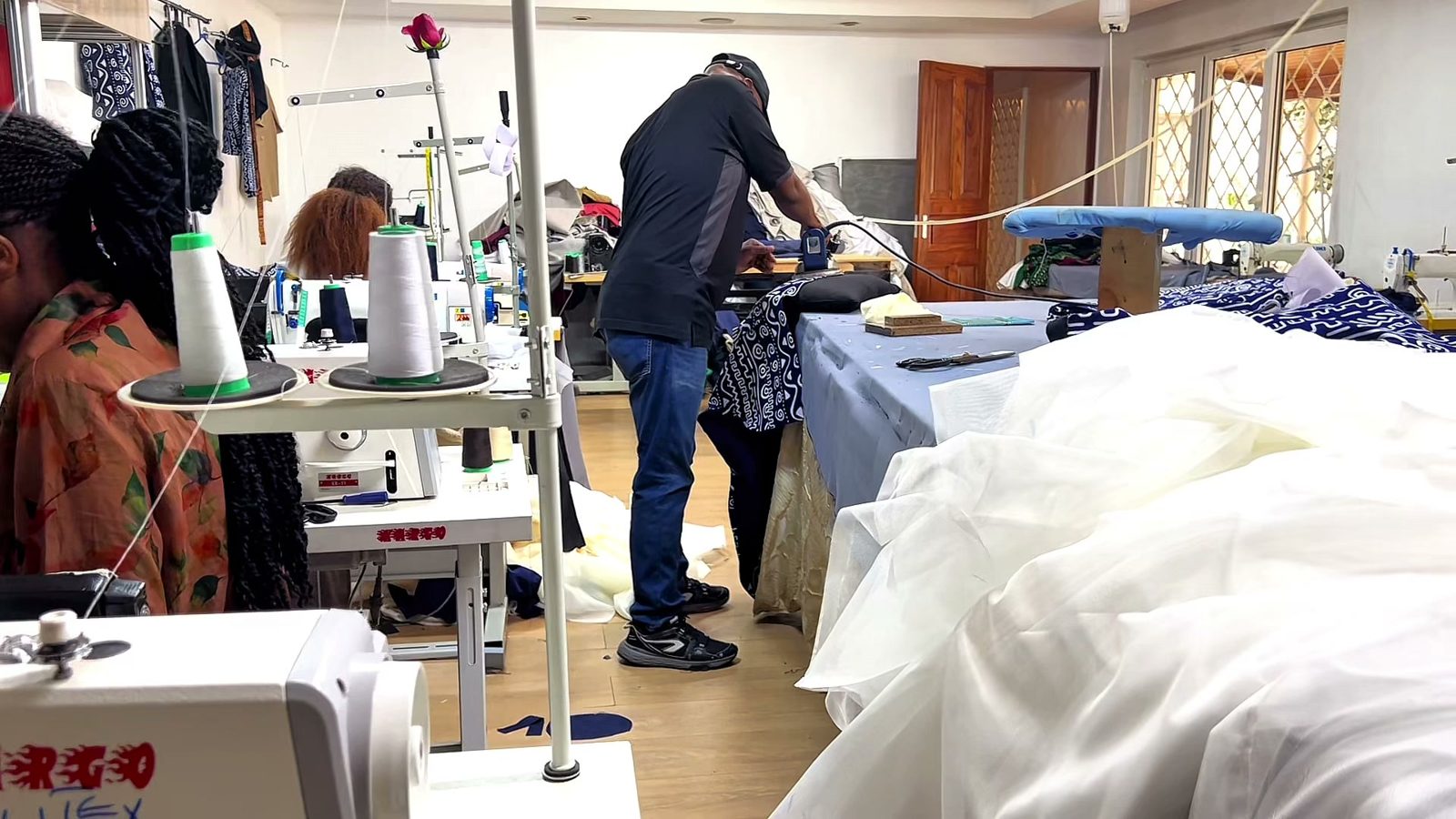 Tailors at work across the Nalitex workshop floor